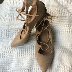 Tan lace-up flats